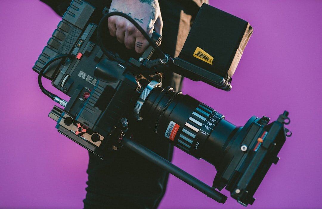 professional filmmaker with camera